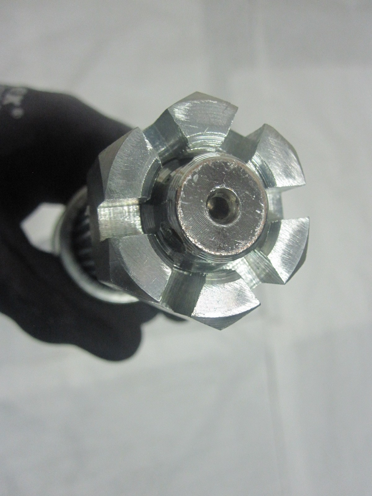 This is an adjustable rear axle for a Yamaha Raptor YFM700. This fits