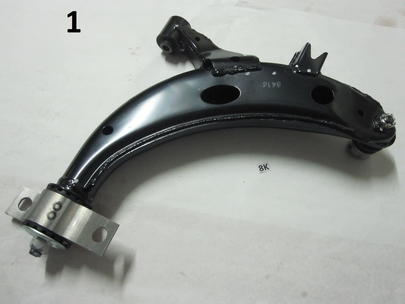 This is a left front lower control arm for a Subaru WRX Impreza. This
