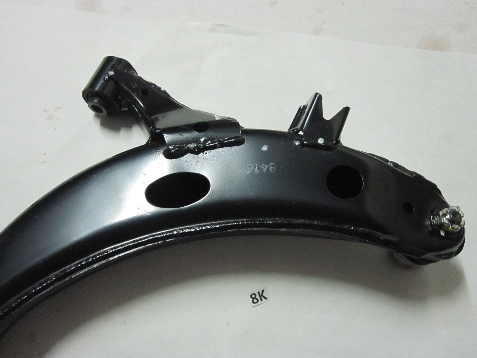 This is a left front lower control arm for a Subaru WRX Impreza. This