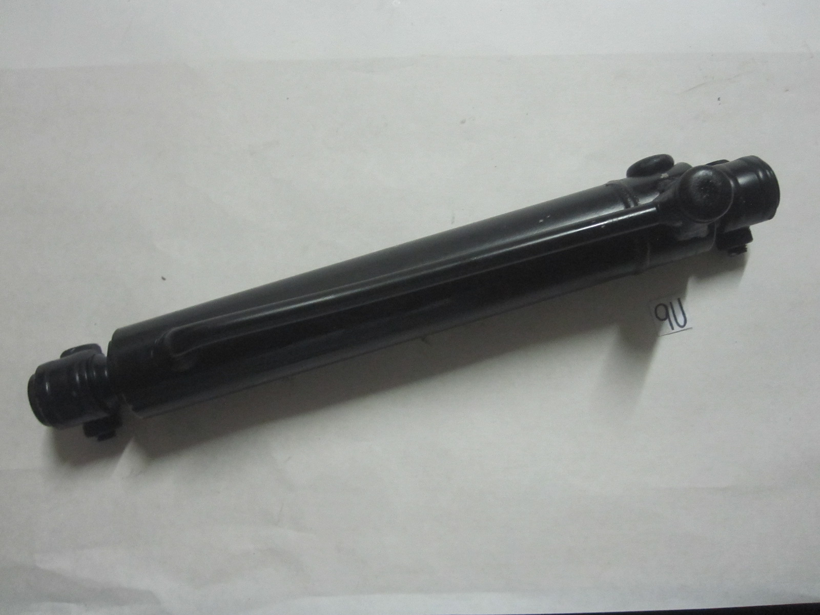 This is a power steering cylinder for a Case 2wd tractor. It fits