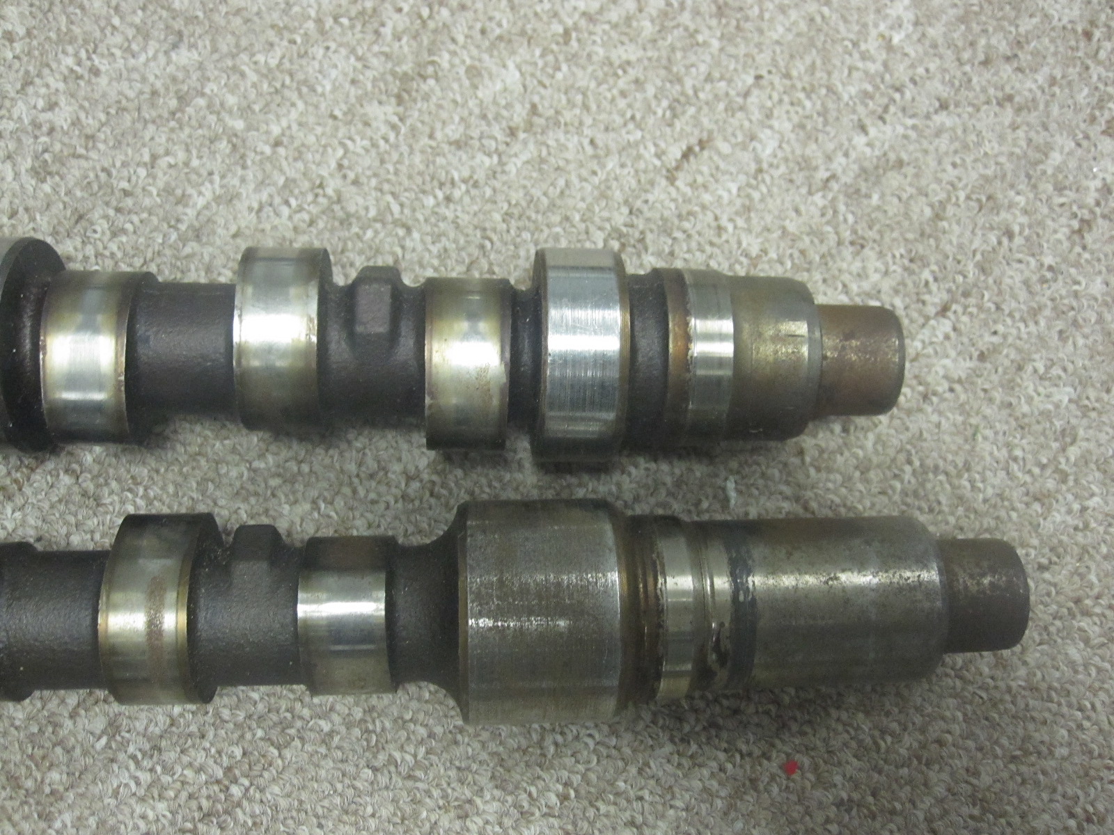 These are a pair of aftermarket (Crower?) camshafts for the Chrylser 3