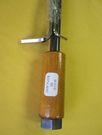 That is a hydraulic dent raiser for removing dents from shotgun barrels