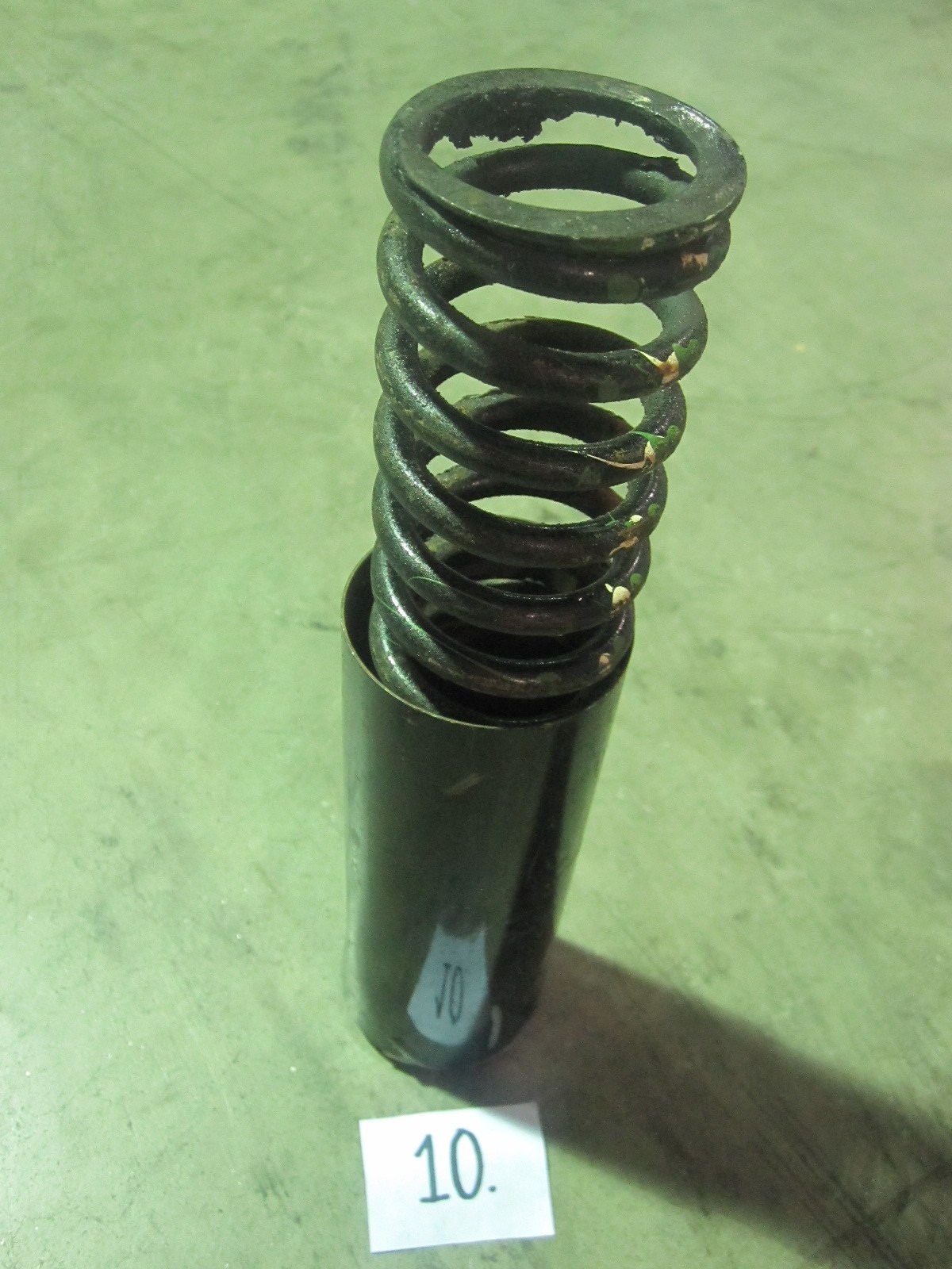 Girling motorcycle shock spring and cover. Used on many British motorcycles of the 50's and 60's