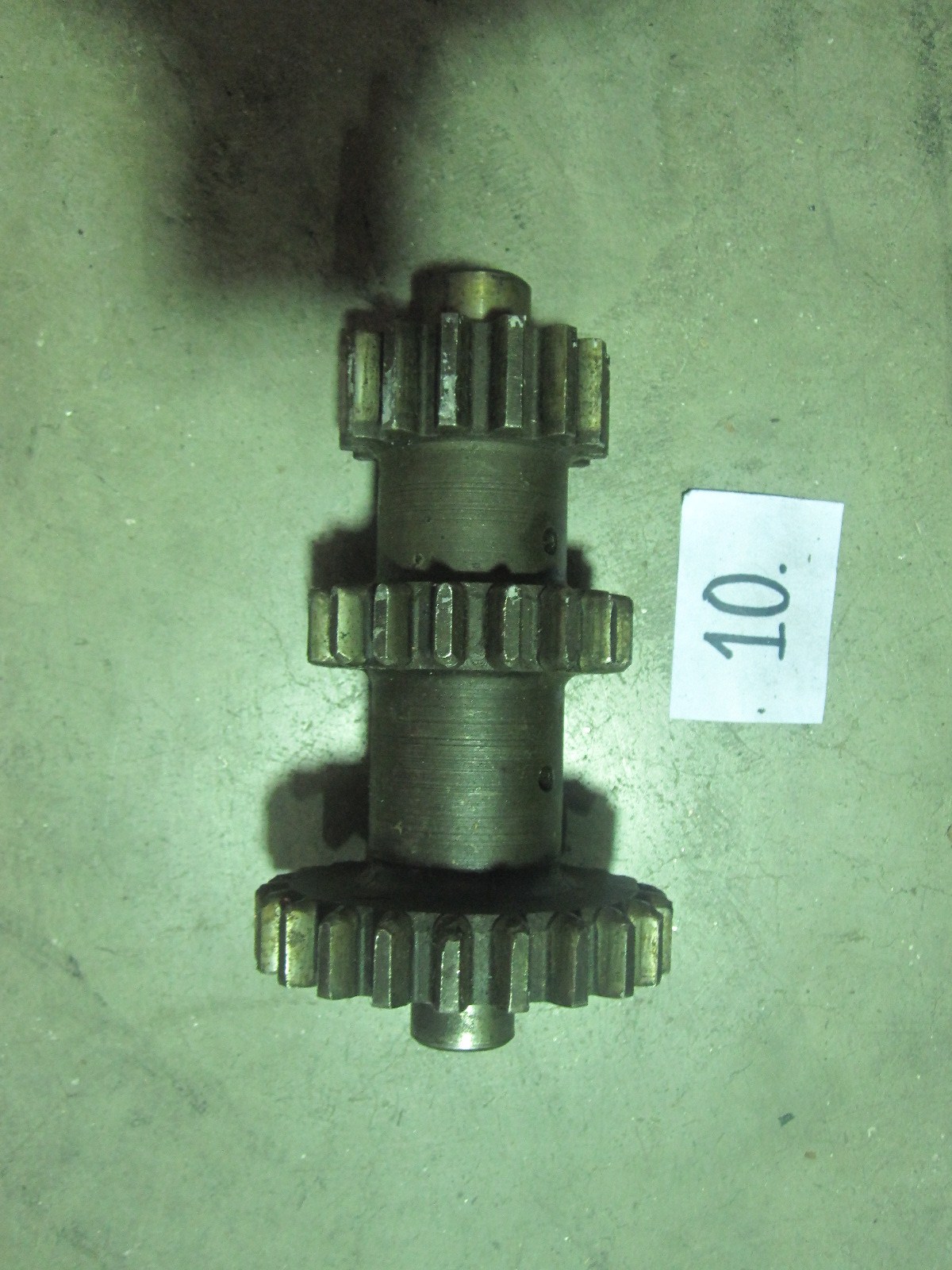 This is an old Indian Chief motorcycle transmission cluster gear. The