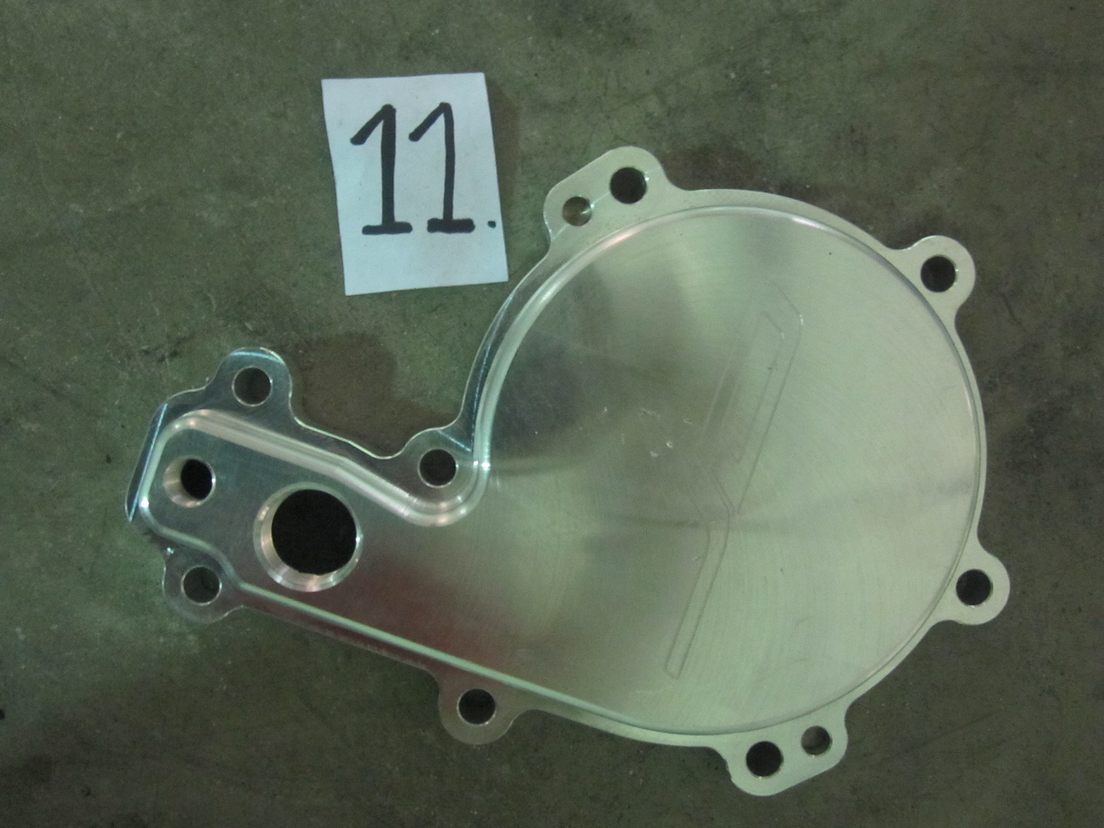 It's an aftermarket water pump cover for 1.5L Rotax powered SeaDoos. I