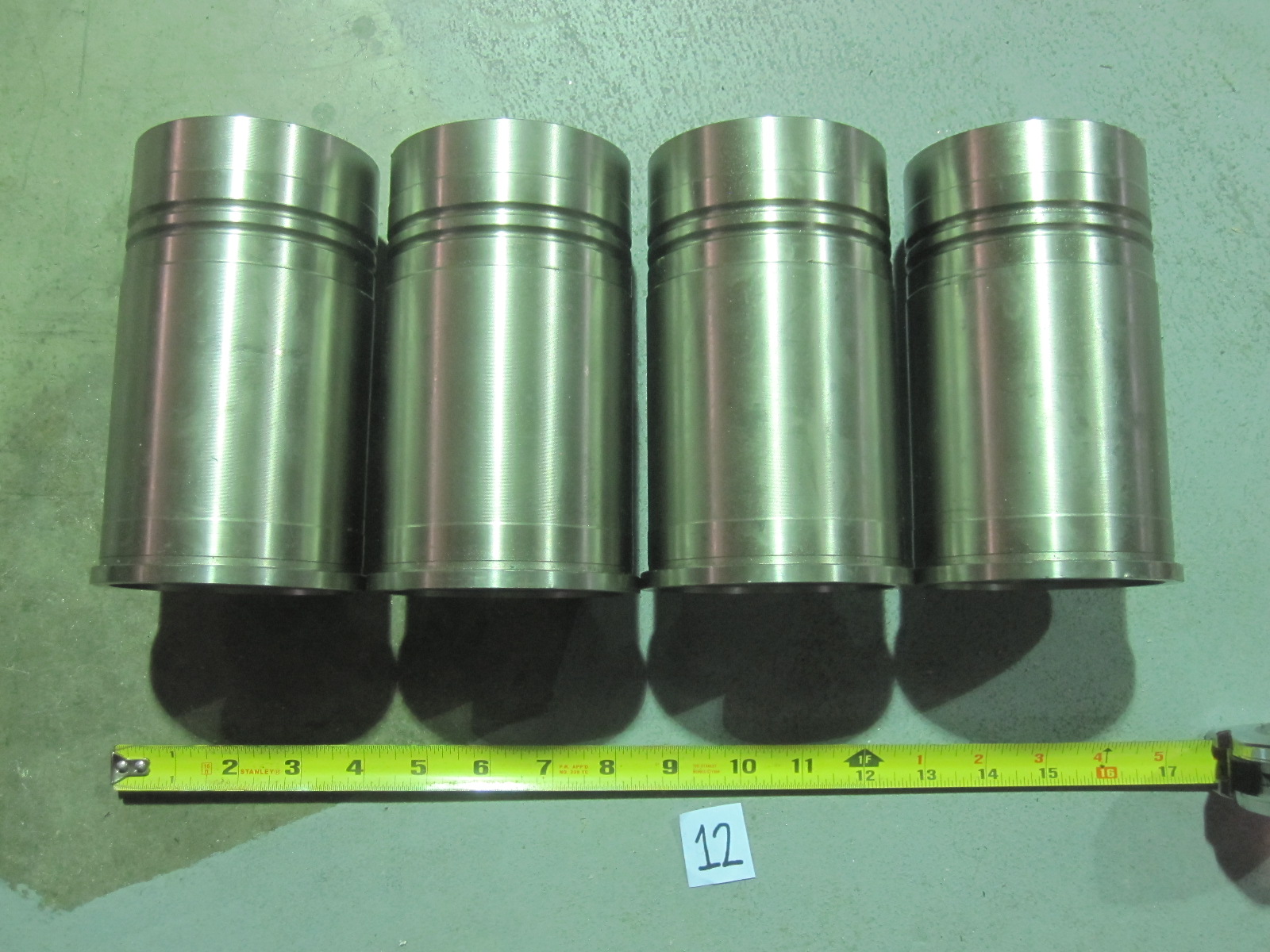 They're piston cylinder sleeves for an Allis Chalmers tractor engine