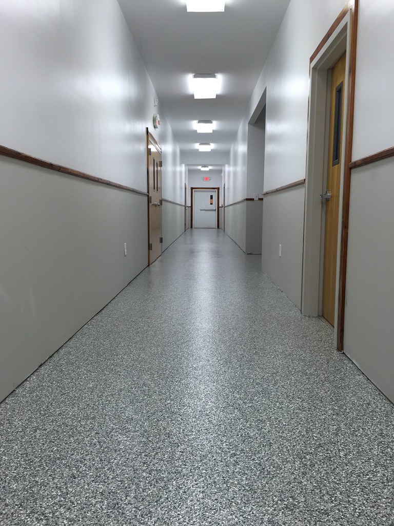 Vinyl chip epoxy floor for a church fellowship Hall in Natural Bridge
