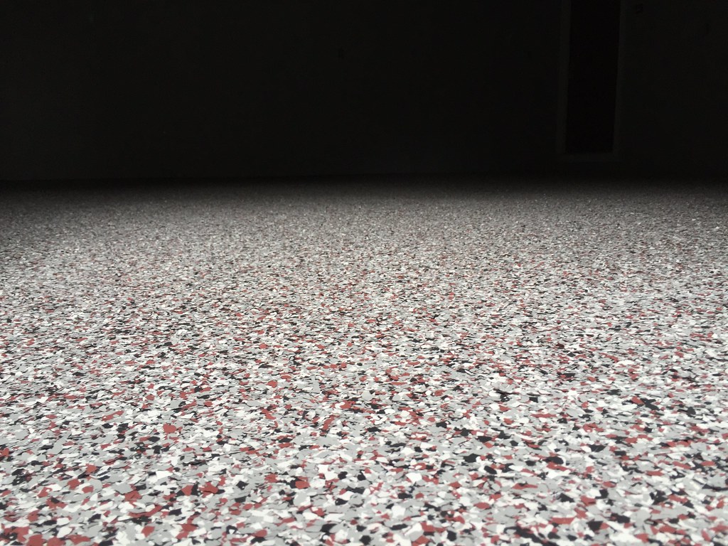Vinyl chip epoxy garage floor in Lynchburg, VA with a custom OSU