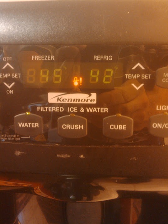 Electronic Kenmore refrigerator not working, what does this sign mean