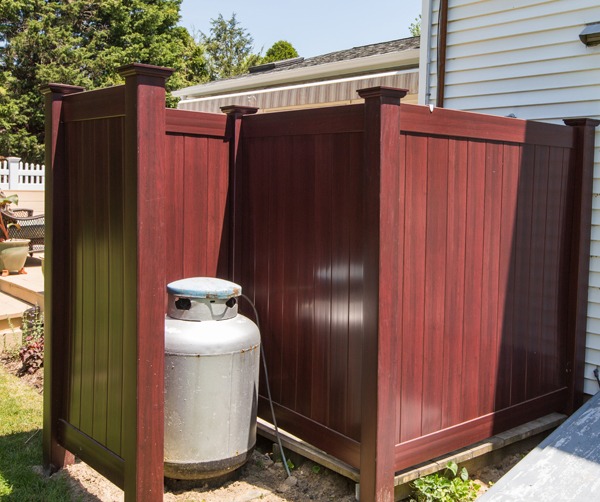 Dumpster Enclosures, Outdoor Showers, and more made out of Vinyl Fence