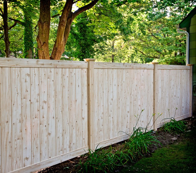 Where can I get vinyl fencing panels that look like real wood