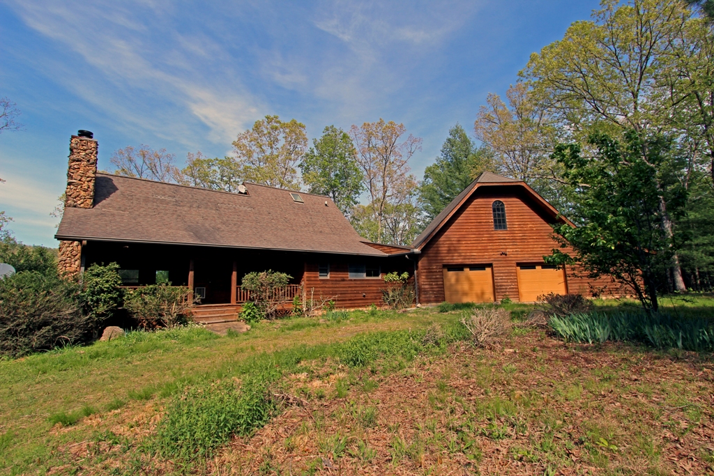 Custom Home With Six Cabins on 192 Acres For Sale in Brasstown NC