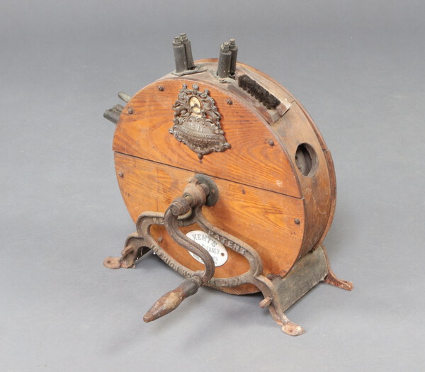 A Kent's knife cleaner on an iron base 41cm h x 43cm w 15th June 2023