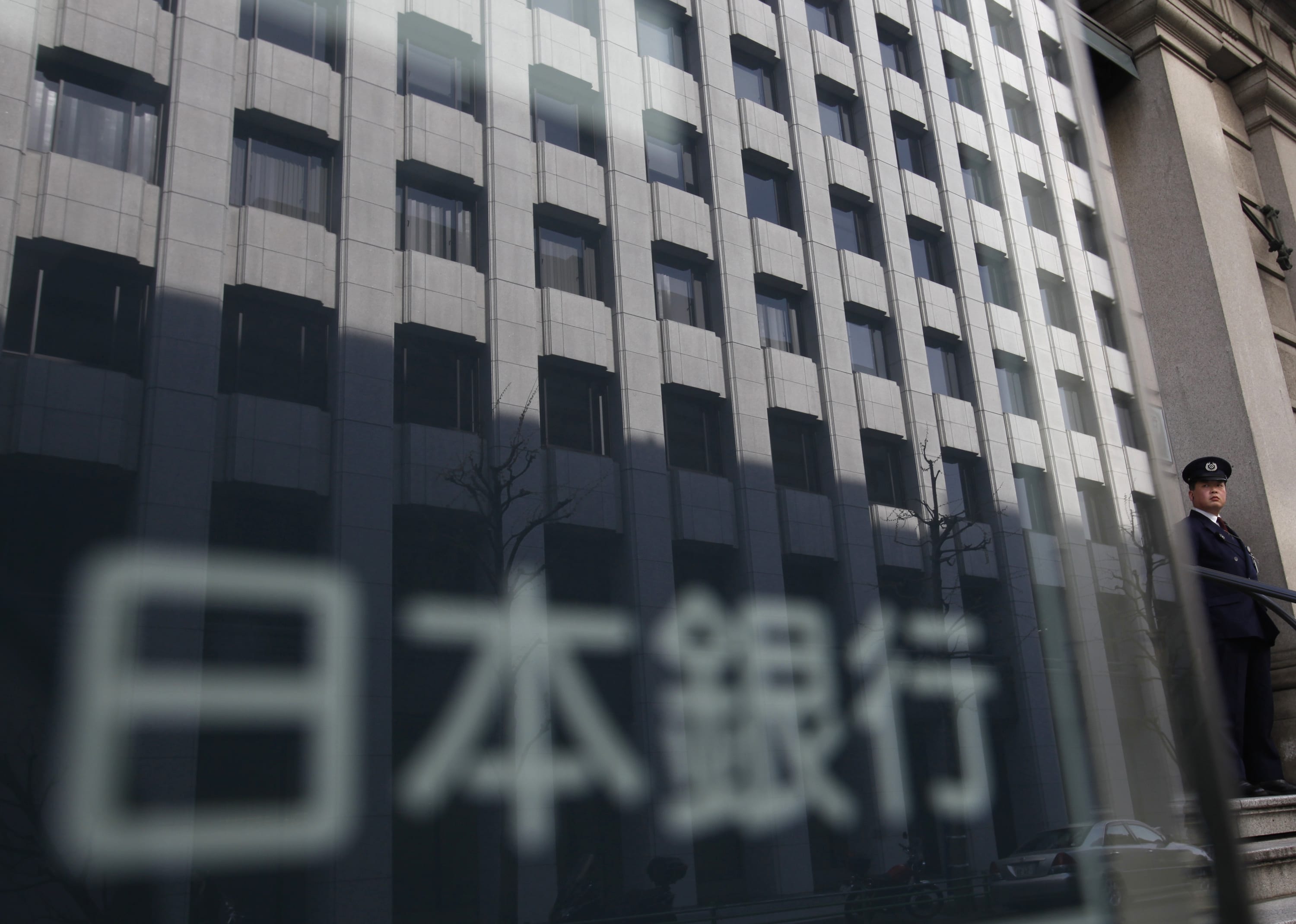 Bank of Japan holds policy steady, would ease to reach 2 inflation