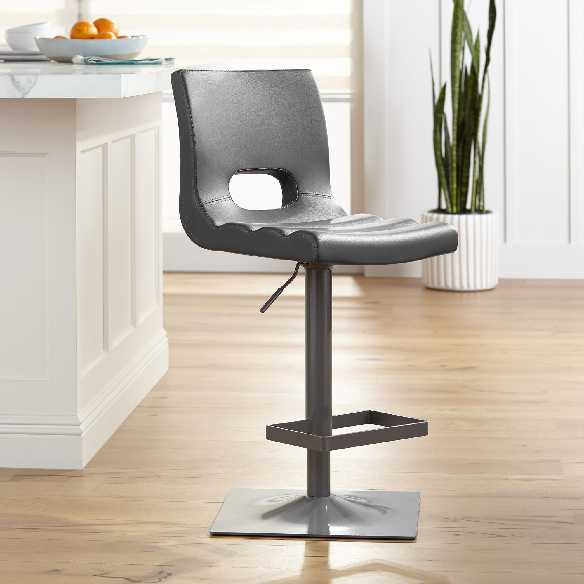 Donovan Gray Faux Leather Adjustable Swivel Bar Stool 6P824 Lamps Plus