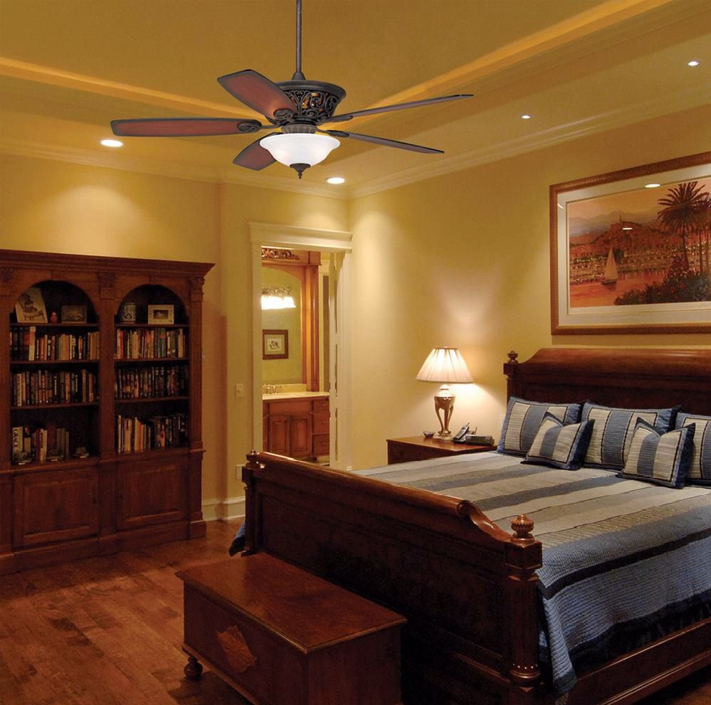 The variety of light fixtures in the masculine bedroom creates a