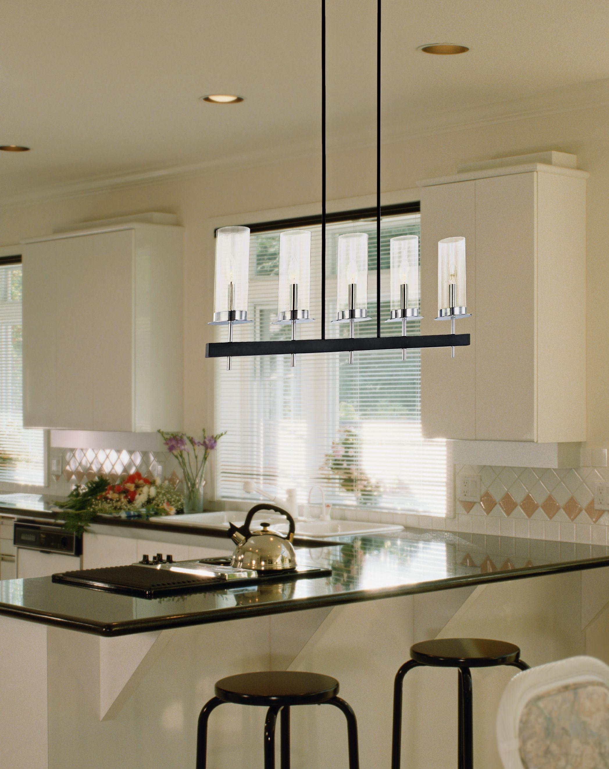 Robert Sonneman Tuxedo pendant lighting over a kitchen