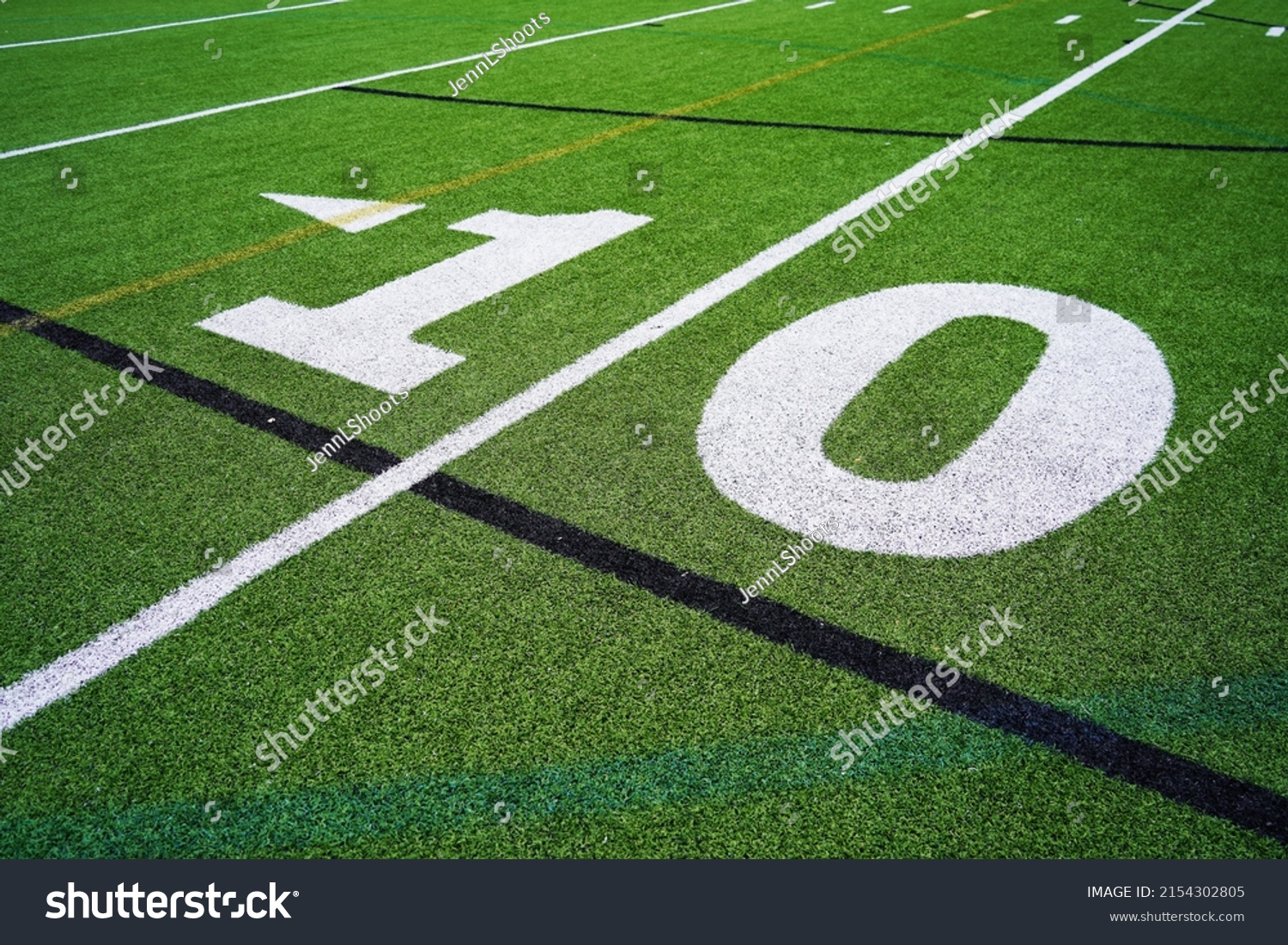 Football field stadium 10 yard line. Royalty Free Stock Photo 2154302805