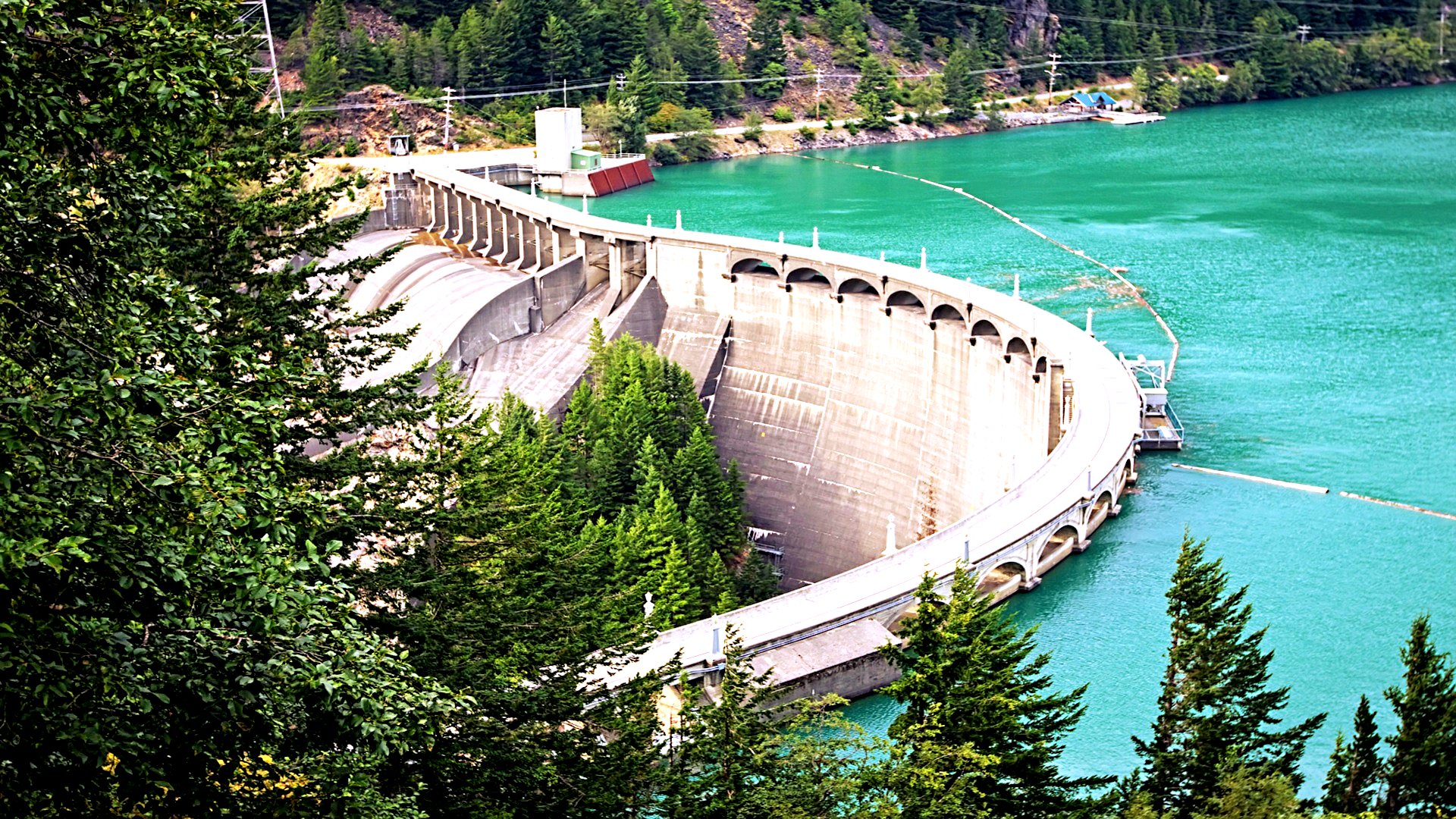 Stunning HD Wallpaper of a ManMade Dam Surrounded by Nature