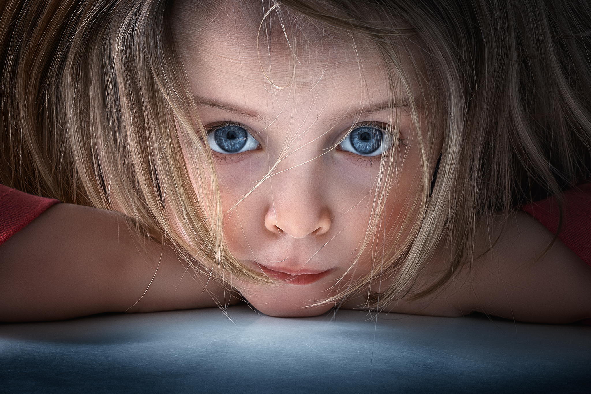 Captivating Child with Blue Eyes HD Wallpaper