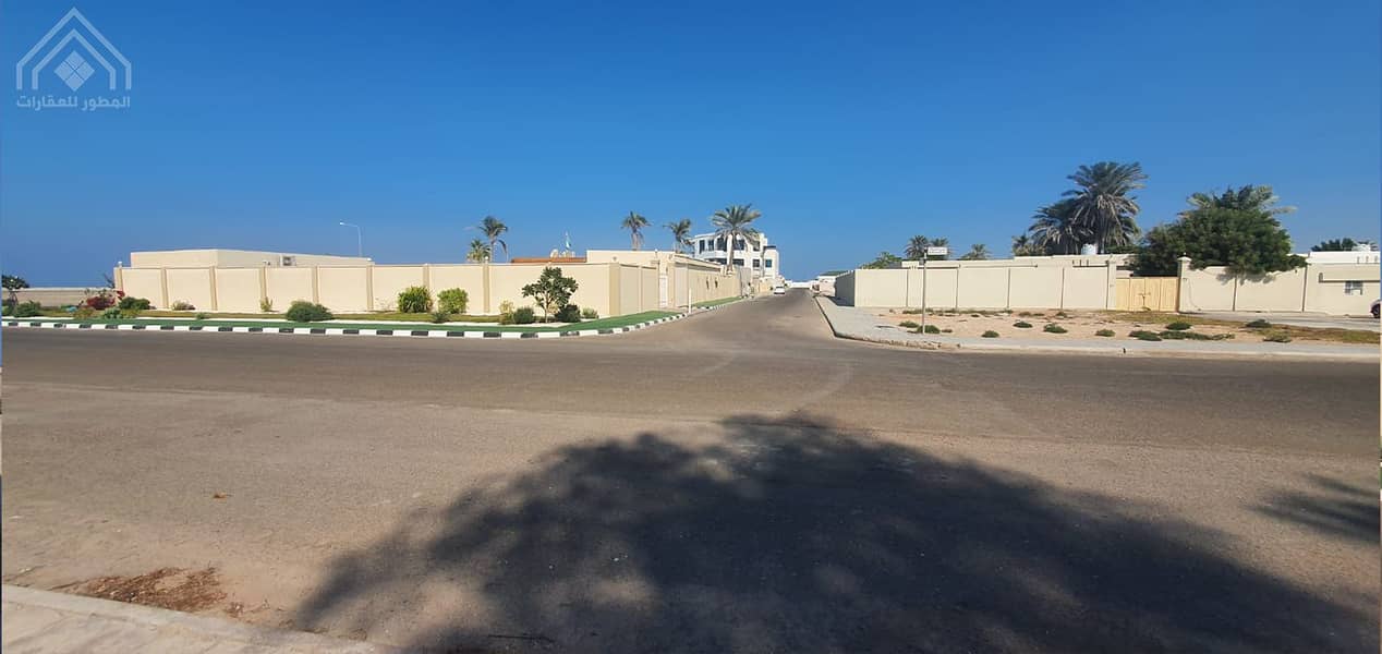 For sale concrete house 12,800 feet Umm Al Quwain Al Hawiyah near the