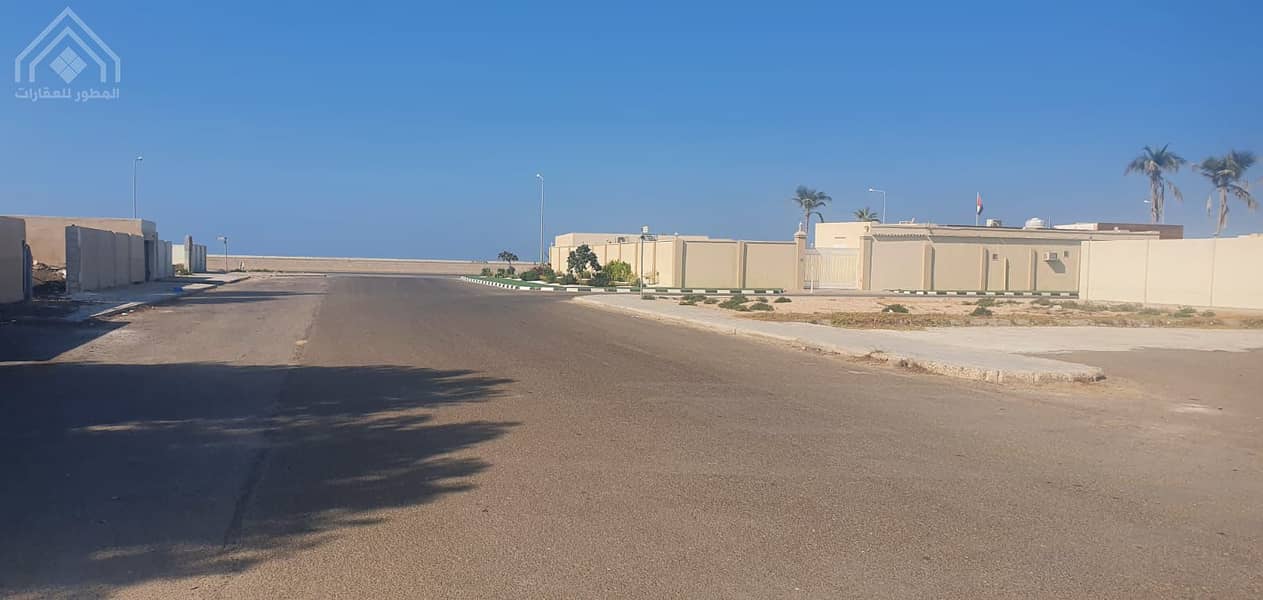 For sale concrete house 12,800 feet Umm Al Quwain Al Hawiyah near the