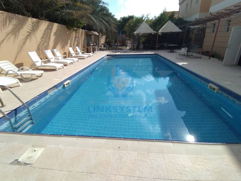 SPACIOUS 2BHK SWIMMING POOL GYM BALCONY IN SAROOJ AL AIN FOR