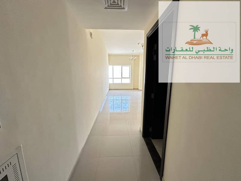 Two rooms and a hall for annual rent in Sharjah on Al Wahda Street, the