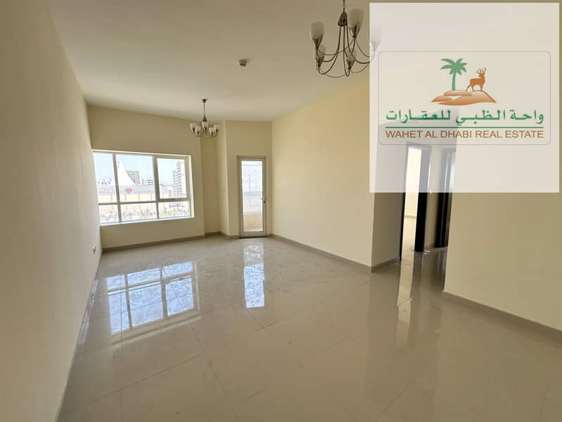 Two rooms and a hall for annual rent in Sharjah on Al Wahda Street, the