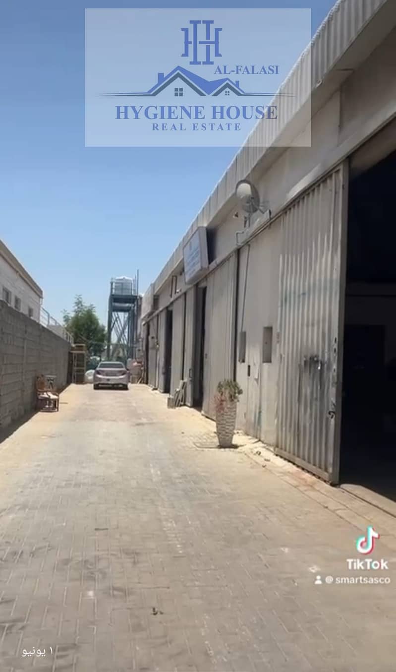 A 1,800squarefoot warehouse for rent in Ajman on a main street with workers’ housing