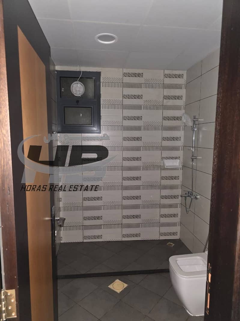 Two rooms and a hall in Al Jurf for annual rent, large area, central