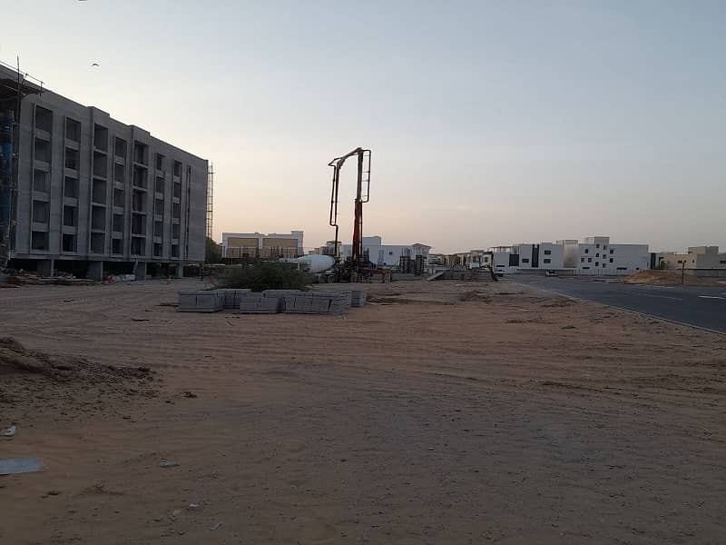 Al Tallah 2 residential land for sale, freehold, next to the Saudi
