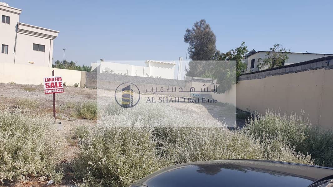 Land for sale corner in Al Ghafia