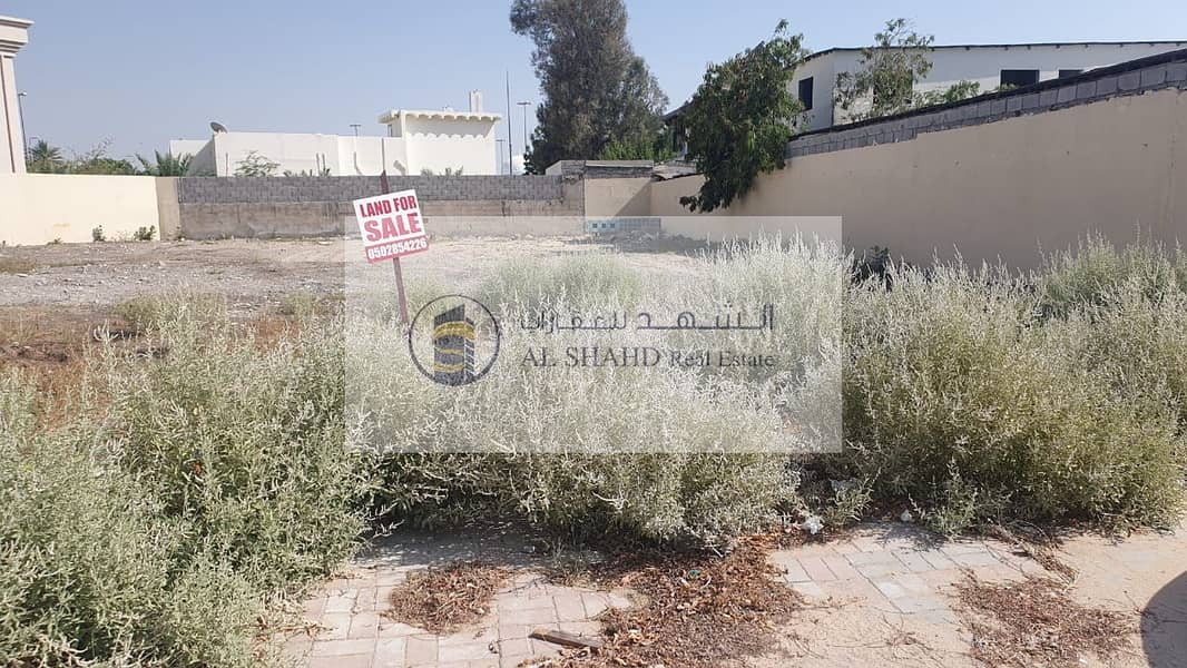 Land for sale corner in Al Ghafia