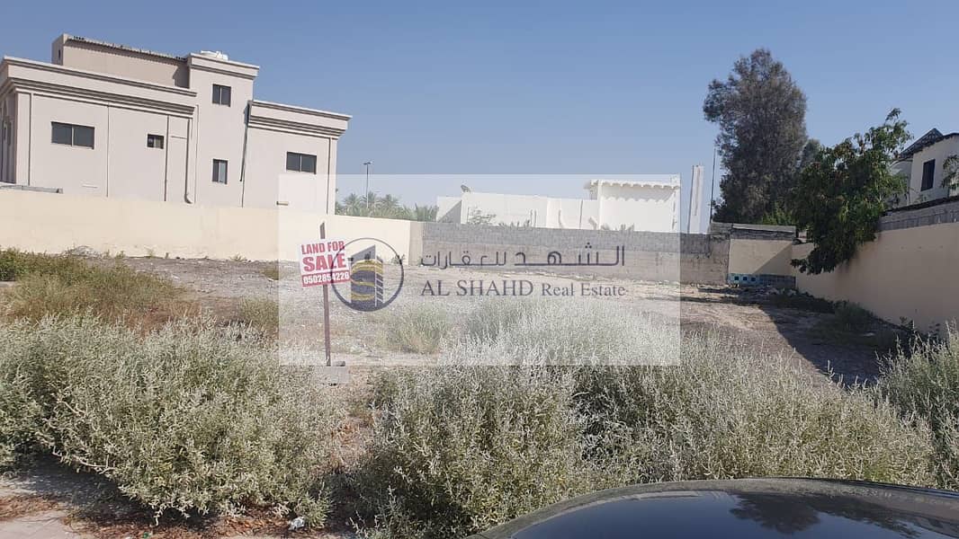 Land for sale corner in Al Ghafia