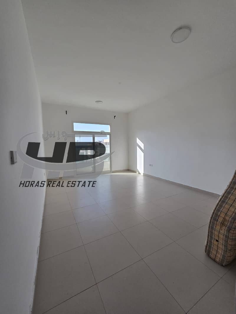 Twobedroom apartment with a hall for rent in Al Jurf 2, opposite the