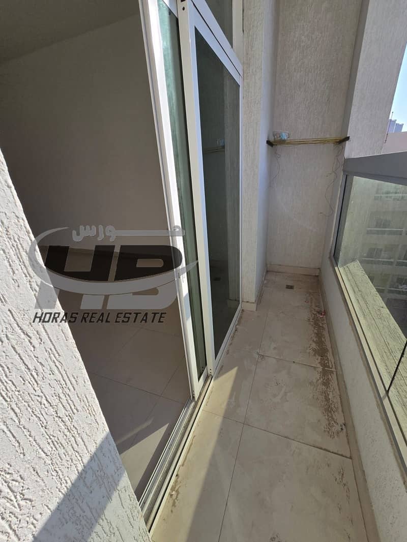 Twobedroom apartment with a hall for rent in Al Jurf 2, opposite the