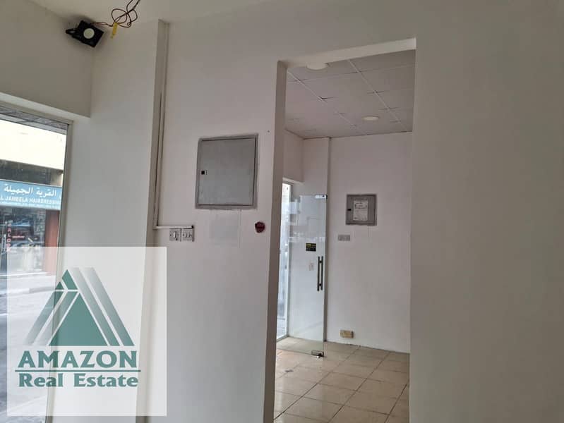 For rent a shop with two doors next to AlKhalij AlArabi Street, Al