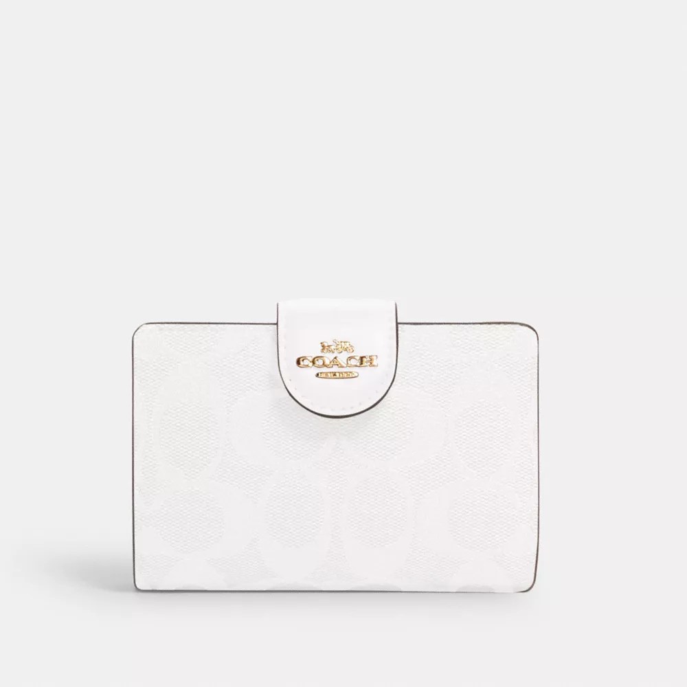COACH OUTLET® Medium Corner Zip Wallet In Signature Canvas