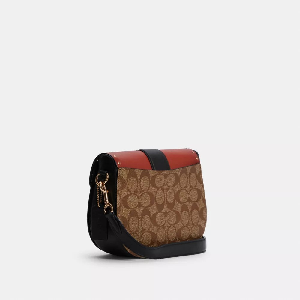 COACH Saddle Bag In Colorblock Signature Canvas With Rivets