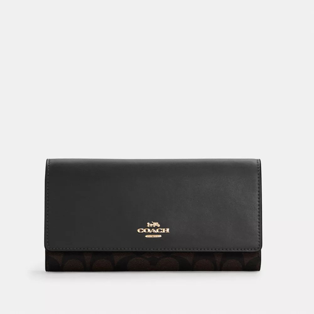 COACH® Outlet Slim Trifold Wallet In Signature Canvas