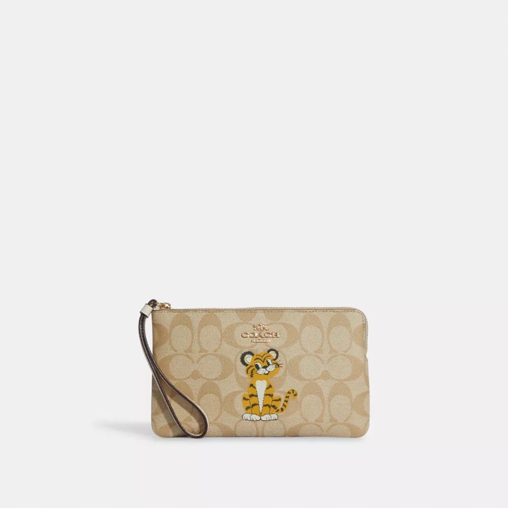 COACH® Large Corner Zip Wristlet In Signature Canvas With Tiger