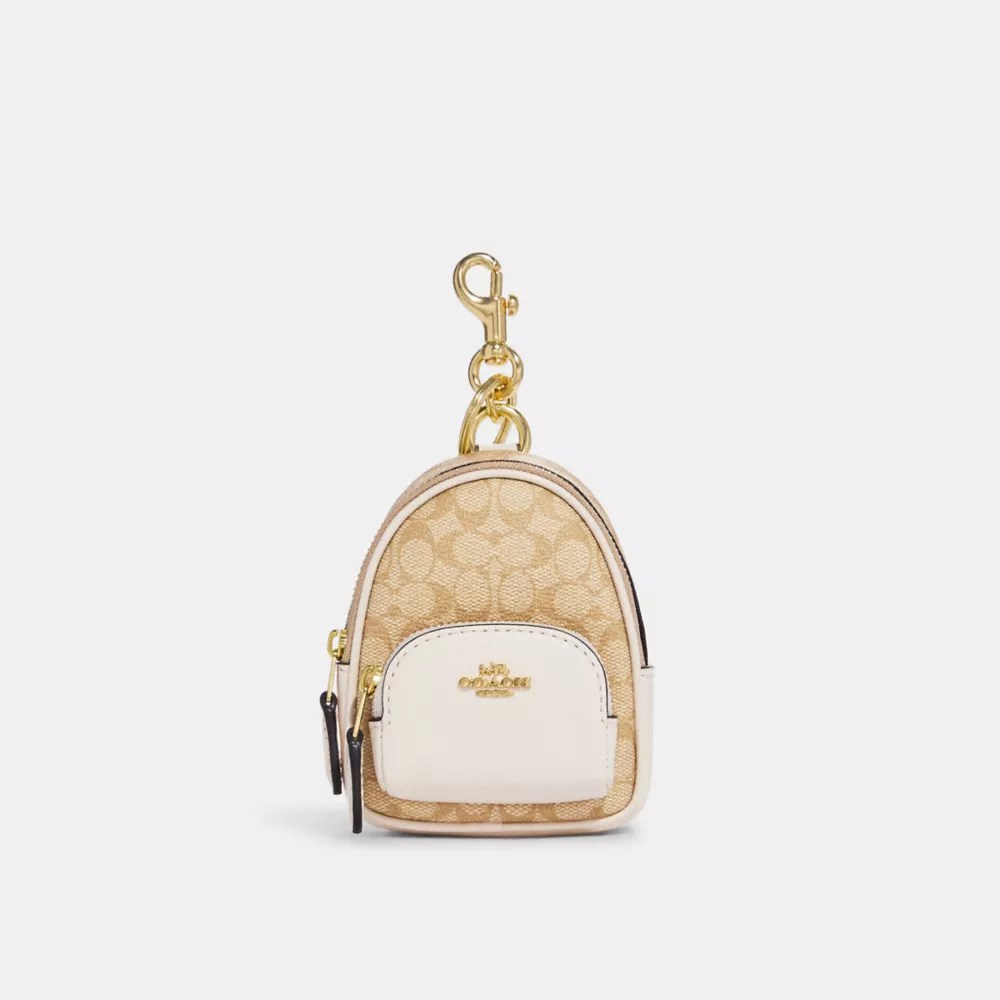Coach Outlet Mini Court Backpack Bag Charm In Signature Canvas In Beige