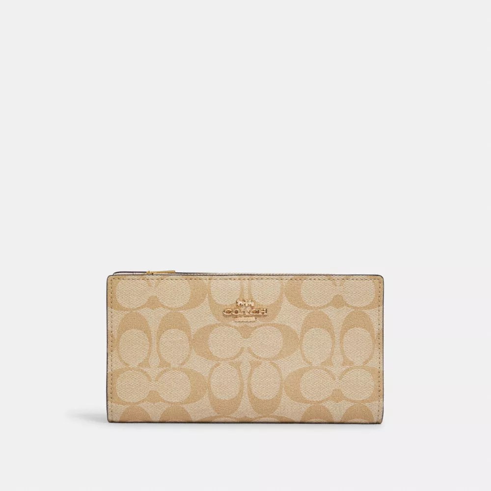 COACH® Slim Zip Wallet In Signature Canvas