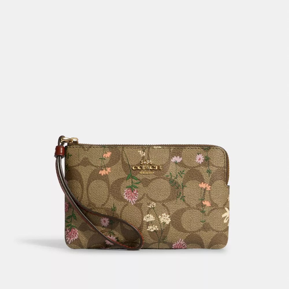 COACH OUTLET® Corner Zip Wristlet In Signature Canvas With Wildflower