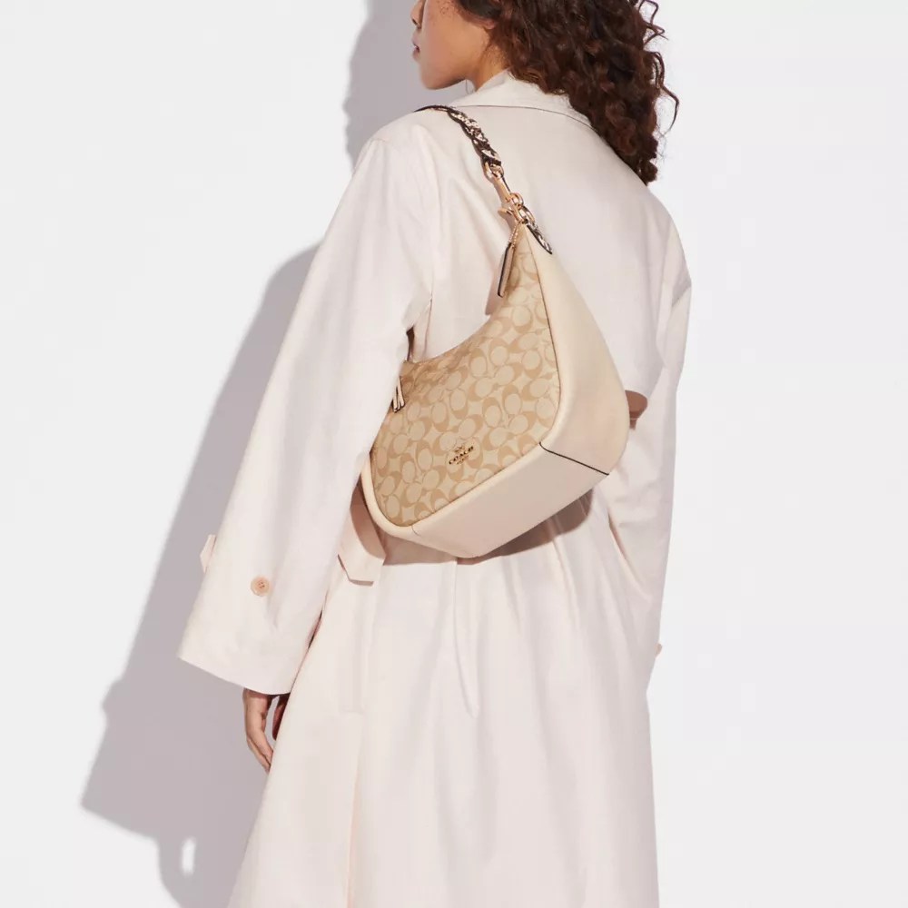 COACH OUTLET® Jules Hobo In Signature Canvas