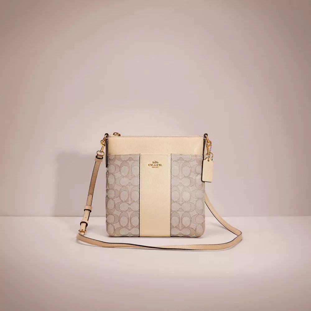 Restored Kitt Messenger Crossbody In Signature Jacquard COACH®