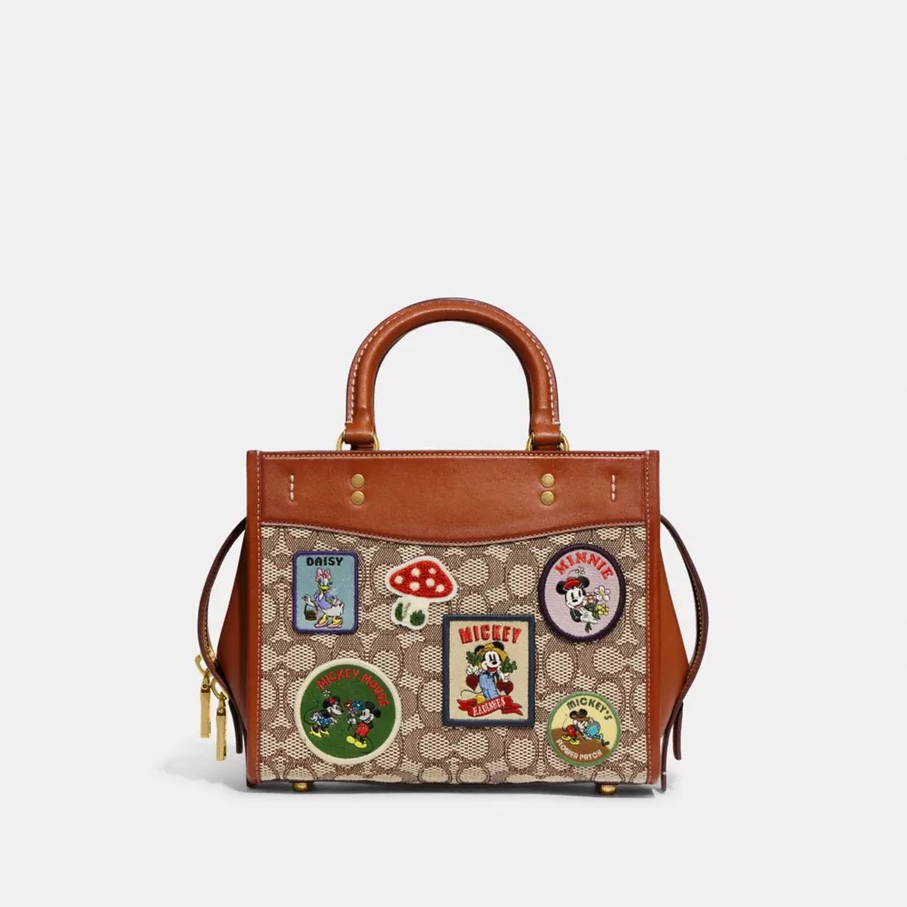 COACH® Disney X Coach Rogue 25 In Signature Textile Jacquard With Patches