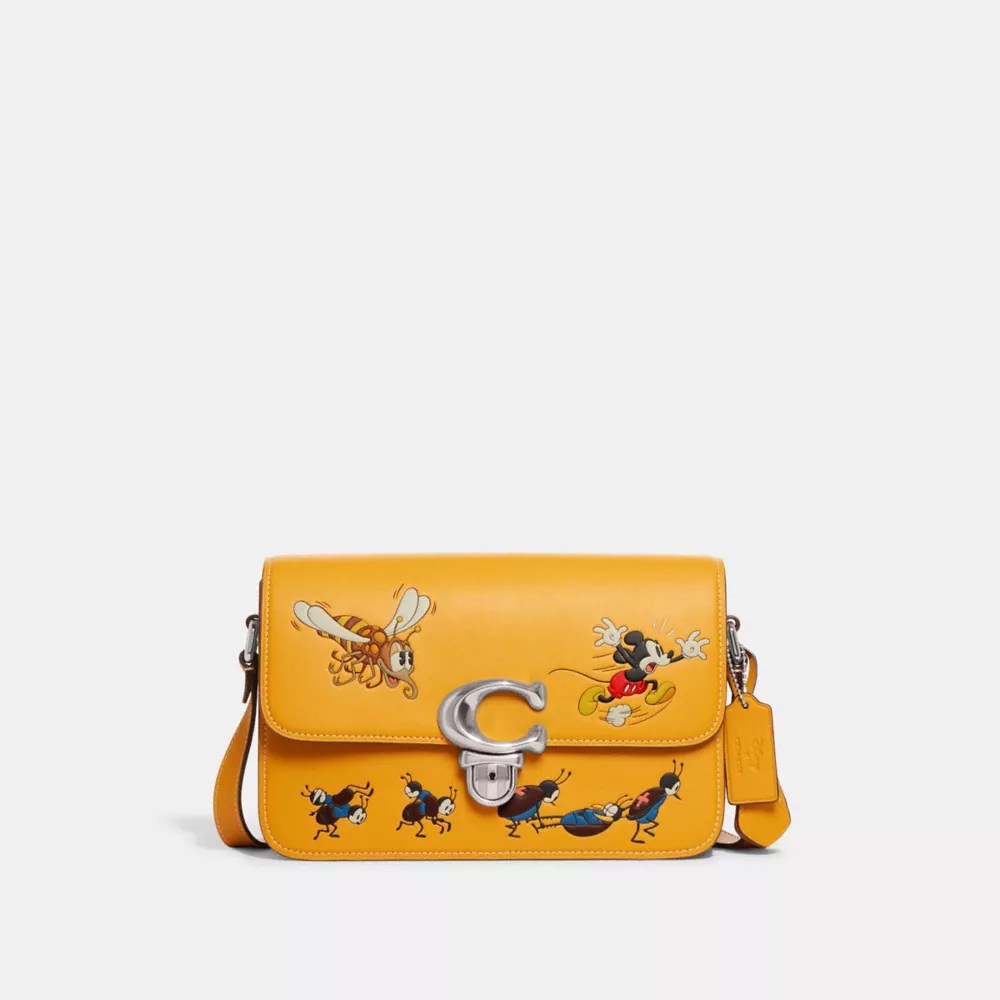 COACH® Disney X Coach Studio Shoulder Bag With Mickey Mouse And Bugs