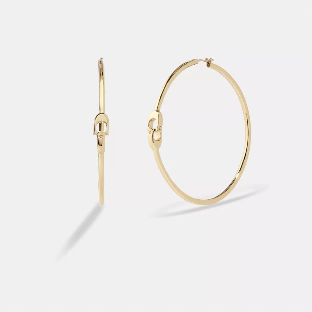 Interlocking Signature Medium Hoop Earrings COACH®